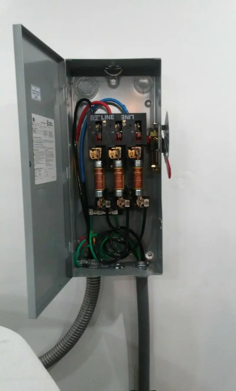 Three-phase disconnect switch installed for Smoke Detector Installation in Oldsmar