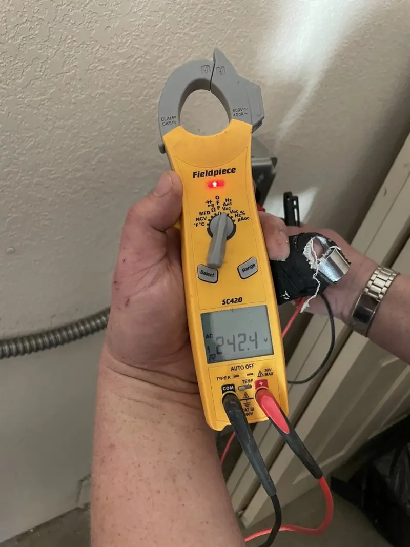 Voltage testing with clamp meter during Generator Installation in Oldsmar